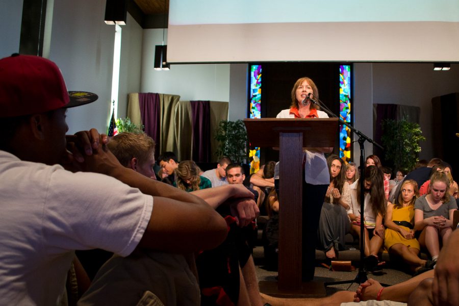 Director of Spiritual Life, Barbara Miller, teaches the We Are His Beloved workshop on Wednesday afternoon. Students were unable to sit comfortably in the pews due to overcrowding. | Ashleigh Fox/THE CHIMES
