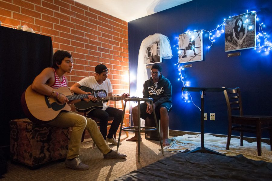 (Left to right) Junior Sean Mickelson, senior Luke Cheng, and junior Charlie Welikala participate in worship and prayer at the Biolae House of Prayer on Tuesday, Nov. 6. | John Buchanan/THE CHIMES