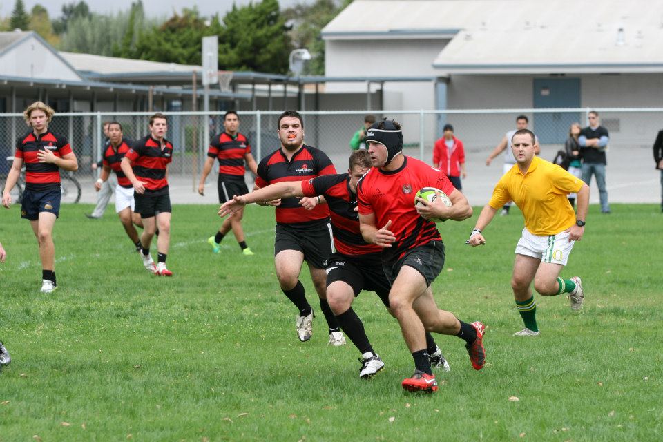 Junior Phil Burton runs against the APU defense. | Courtesy of Anthony Cantu 