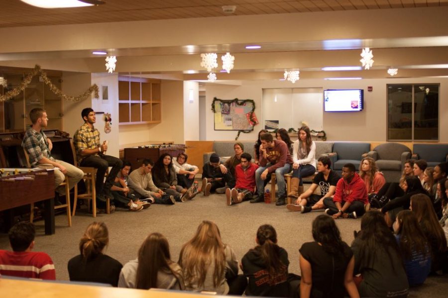 Led by Senior Peter Bell and sophomore Samuel Alex, Biola students gather in Hope's lobby on Dec. 14 to pray for the families and victims of Friday's shootings. | Grant Walter/THE CHMES