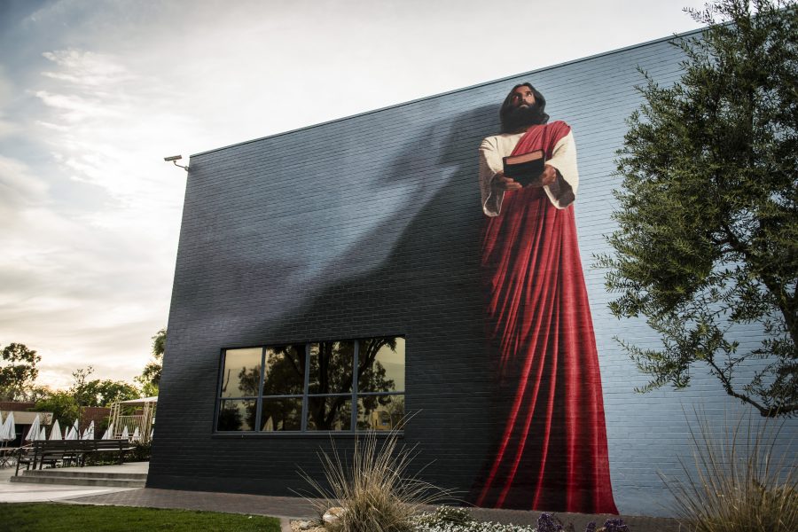 The Jesus mural, located on the side of Barwell Hall near the Caf, was restored in 2011 and has been at the center of discussion for racial diversity on campus. | Olivia Blinn/THE CHIMES