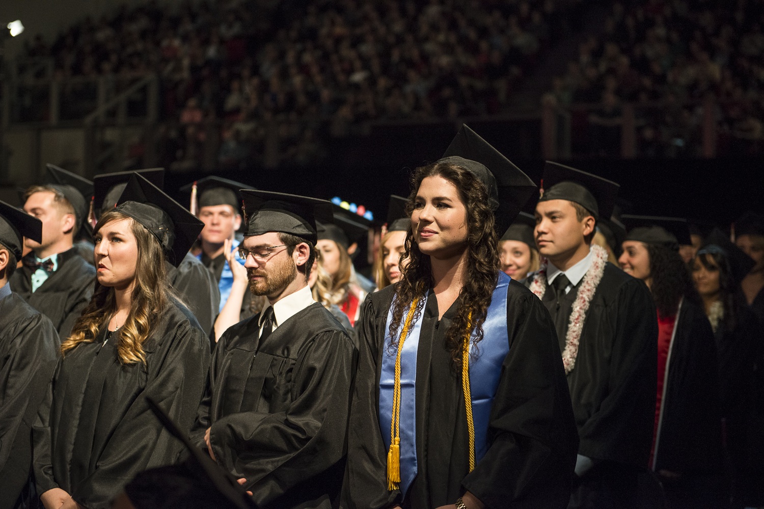 Students prepare to walk up to the stage during fall commencement. In order to improve the retention rate, Biola is working on implementing better academic planning for students. | Job Ang/THE CHIMES