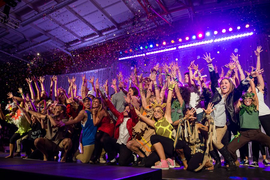 The Chicken Poc crew surprises the crowd with confetti during their finale dance to Hey Ya. | Olivia Blinn/THE CHIMES

