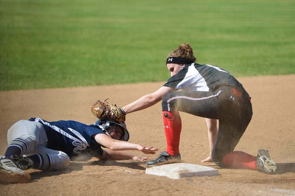 Senior Sarah Stromwall prevents the opposing team from scoring during on of the team's home games. Biola softball follows their split with Concordia with another at San Diego Christian. | Anders Corey/THE CHIMES [file photo]