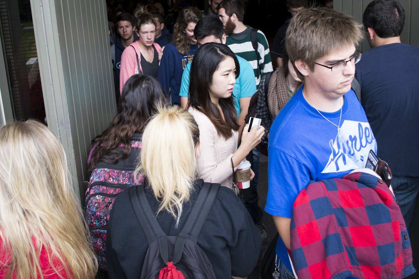 A rush of students pile out of a jam-packed Calvary Chapel after getting scanned for one of the last few chapels of the semester. Ashleigh Fox/THE CHIMES