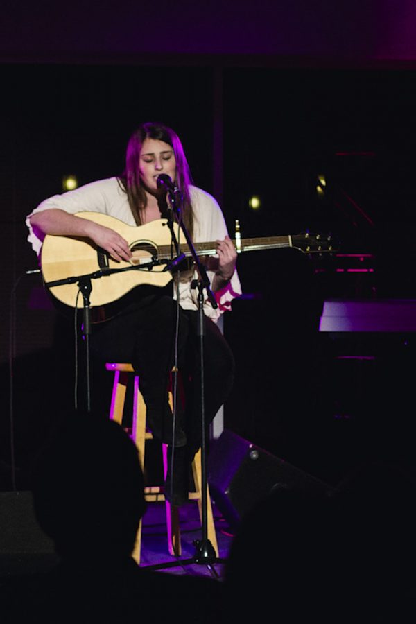 Seniors Lauren Bailey performs a cover of Slow Dance by John Legend at the Eddy on February 14. Bailey has been an essential part in making the Eddy a more popular musical venue on campus. | Heather Leith/THE CHIMES [file photo]