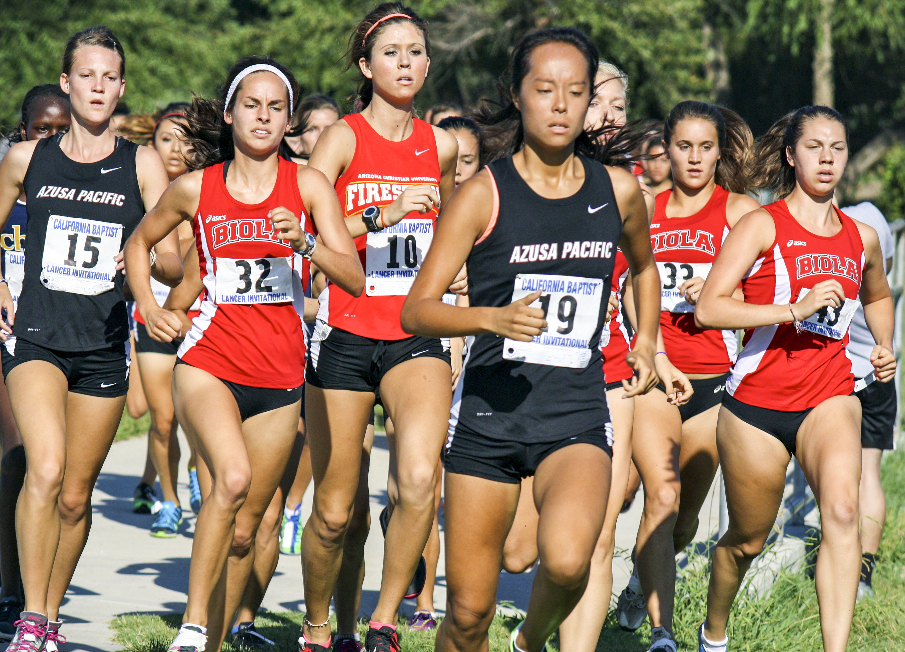 Freshman Lyndee Dawson, sophomore Anika Gasner and junior Carrie Soholt stay together during the California Baptist University Lancer Invitational on September 7. The Aztec Invitational proved successful for the girls this week as they took home a second place finish. | Courtesy of Jessi Kung