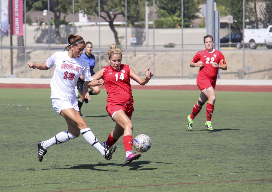 Senior midfielder Victoria Dalla Zanna battles for the ball during the blowout game against Antelope Valley College on September 14. | Natalie Lockard/THE CHIMES