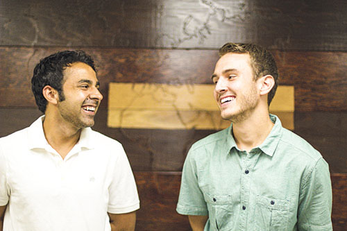 Student Missionary Union president Roddy Garcia (left) and team development staff member Garrett Brooks (right) sit down to share SMU’s vision for 2013. Garcia is pushing his 28-person staff to focus on local missions this year. | Natalie Lockard/THE CHIMES