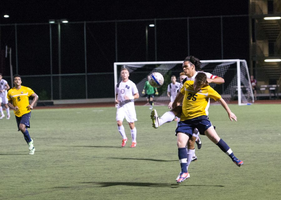 Senior team captain Daniel Chew fights to get to the ball during Tuesdays game vs. Marymount. | Kalli Thommen/THE CHIMES