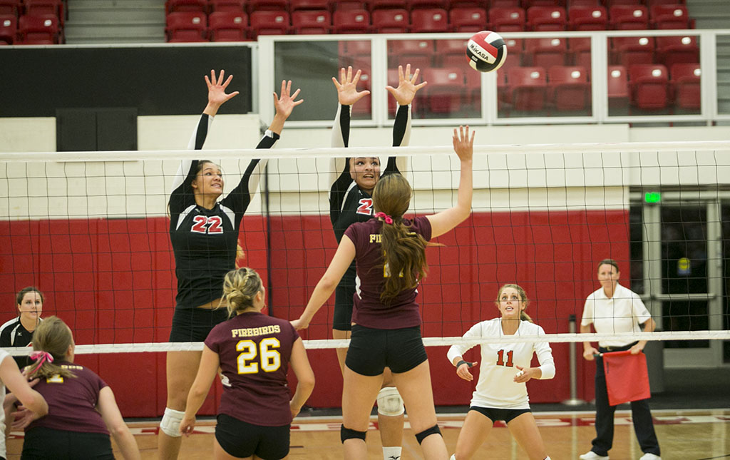 Sophomores Lauren Hoenecke and Joclyn Kirton put up a powerful block against Texas-Brownsville. Unfortunately for womens volleyball, that strength was not enough to overpower the #2 team in the GSAC Conference on October 22. | Tomber Su/THE CHIMES