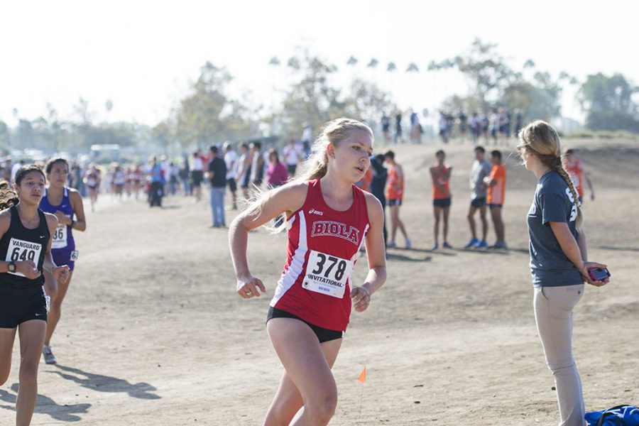 Senior Chelsea Janzen gets ahead of the competition during the Vanguard Invitational. | Ashleigh Fox/THE CHIMES 