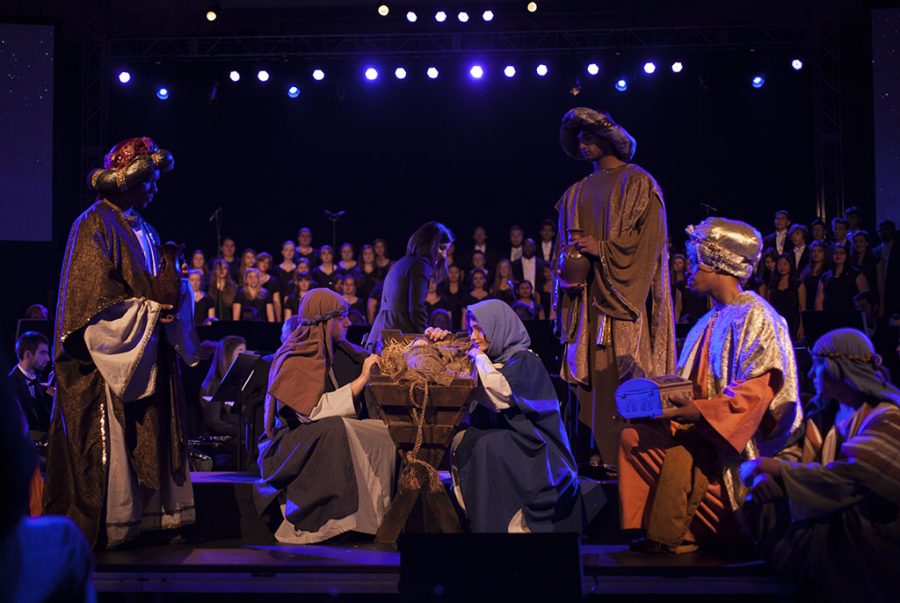 Biola+students+reenact+the+manger+scene+during+the+Christmas+chapel.+Opinions+editor+R.J.+Winans+embraces+the+reality+of+Christs+birth+while+moving+past+the+superficial+perfect+manger+scene.++%7C+Melanie+Kim%2FTHE+CHIMES