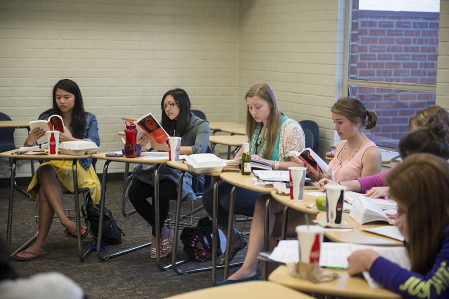Torrey students discuss a book during class in Sutherland Hall. Christina Bryson, senior Torrey student, displaces the myths of being a Torrey student. | Aaron Fooks/THE CHIMES