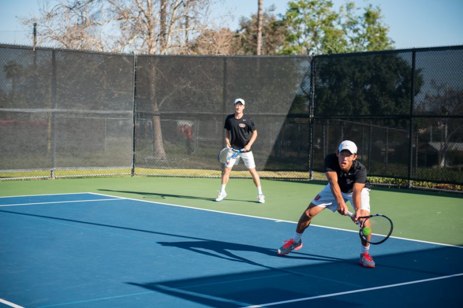 Junior+Brandon+Cheng+reaches+for+a+last-minute+save+during+his+doubles+match+against+Arizona+Christian+University+on+April+4.+Cheng+and+his+doubles+mate+senior+Chris+Evans+beat+their+ACU+opponent+8-4.+%7C+Ashleigh+Fox%2FTHE+CHIMES