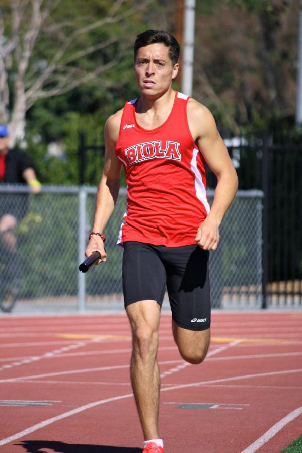 Senior Danny Ledesma pushes through the 1,500 meter race during the La Verne meet earlier this season. Senior Danny Ledesma ran 4:02.11 in the 1,500 meter race at the Point Loma Collegiate Invitational on Saturday to secure a first place finish, sending him to Outdoor Nationals. | Courtesy of Jessi Kung