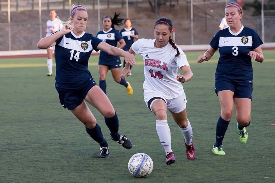 Senior midfielder Amanda Lillicrop steals the ball away from two players from Vanguard University at the game on Oct. 18. | Ana Waltschew/THE CHIMES