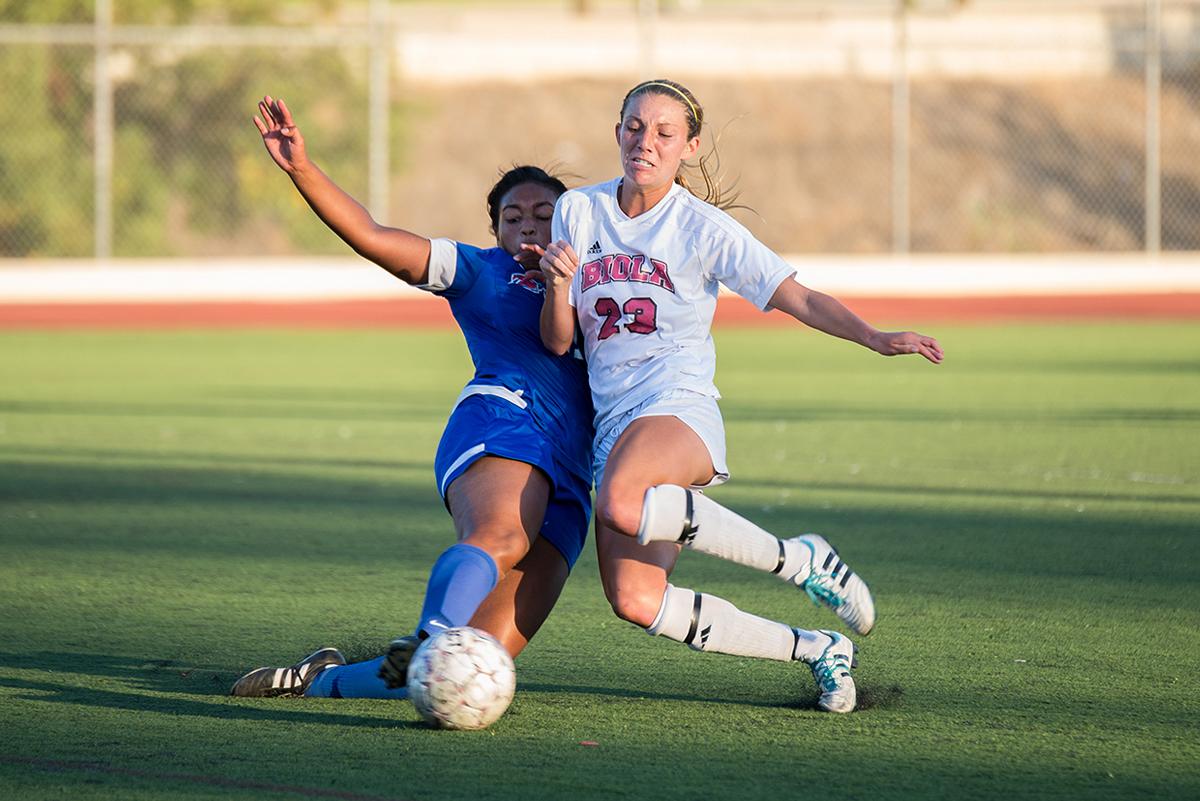 Sophomore forward Taylor Venegas slides to reach the ball at the women's soccer game against William Jessup University on Oct. 4. | Jenny Oetzell/THE CHIMES