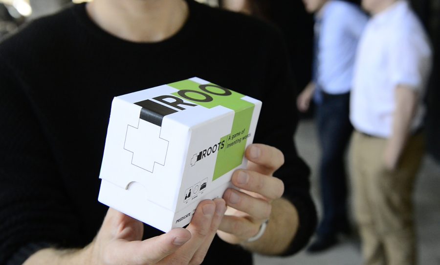The outside packaging of the Roots game is shown. The game was lead by Talbot philosophy student Joe Ko.