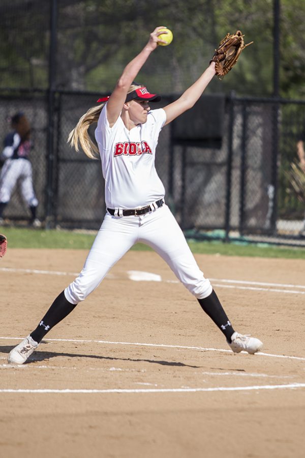 Freshman Terri Van Dagens setting up her pitch during the softball game on Feb. 17. | Molli Kaptein/THE CHIMES