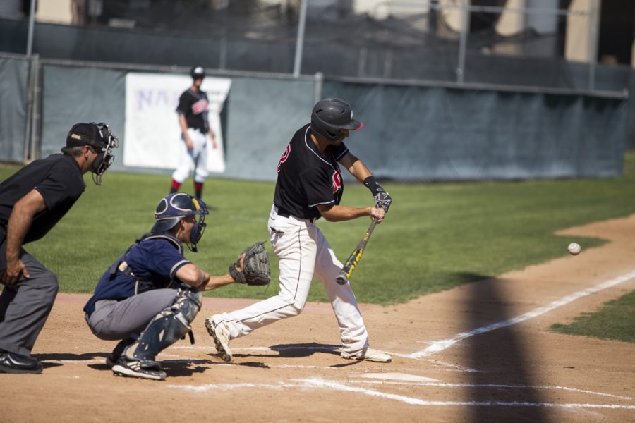 Senior Andy Smith swings at a pitch from San Diego Christian College on April 17. Biola baseball struggled at home this season, earning under .500 in wins. | Cherri Yoon/THE CHIMES