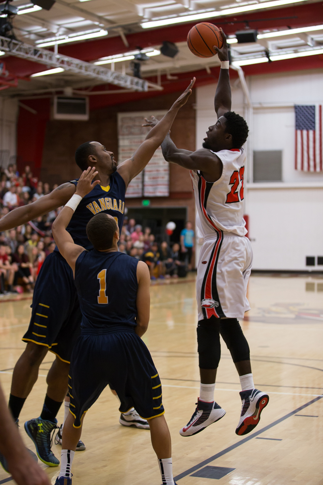 Freshman Steve Herve intercepting the ball from the Vanguard defense this past season. | Molli Kaptein/THE CHIMES [file photo]