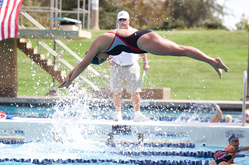 Freshmen break school records as several swimmers qualify for nationals.