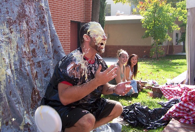 Jeff Blied gets a pie in the face in an effort to raise money for a missions trip to Romania.