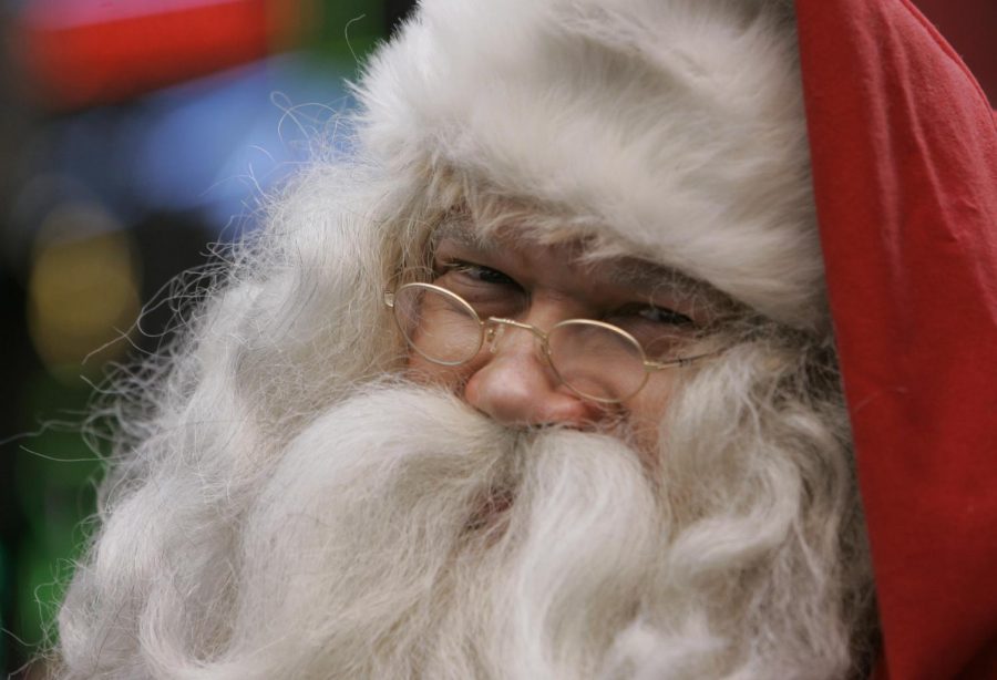 Santa Claus from Finland, gestures during a Christmas promotional event for a shopping center in downtown, Hong Kong Thursday, Nov. 29, 2007.