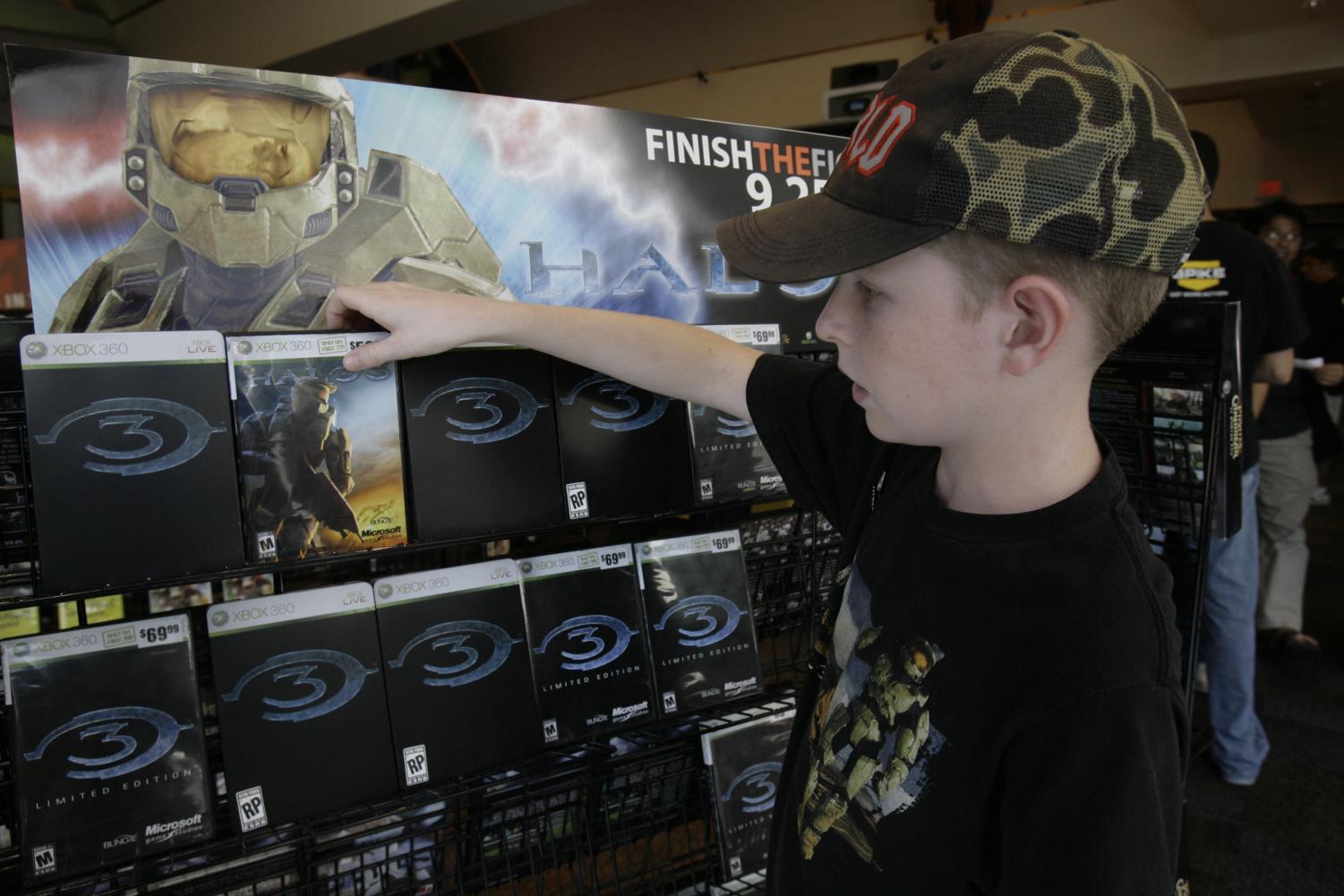 Tristan Greenwood, 12, looks at a display of Microsoft's "Halo 3" at Universal Studios Citywalk