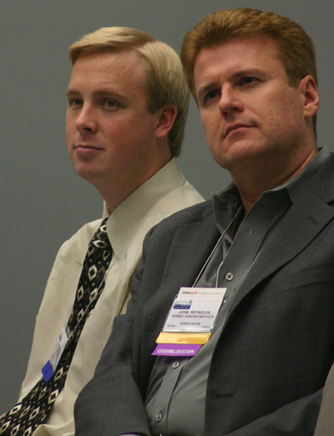 Junior Dustin Steeve and Professor John Mark Reynolds listen in on a session of the 2007 GodBlog conference in Las Vegas.