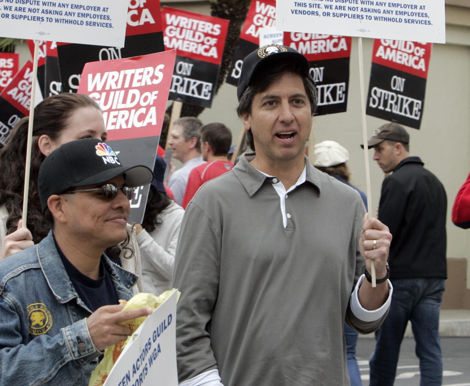 Actor Ray Romano walks on a Writers Guild of America picket line outside Paramount Studios in LA as the writers strike enters its fourth day Thursday, Nov. 8.