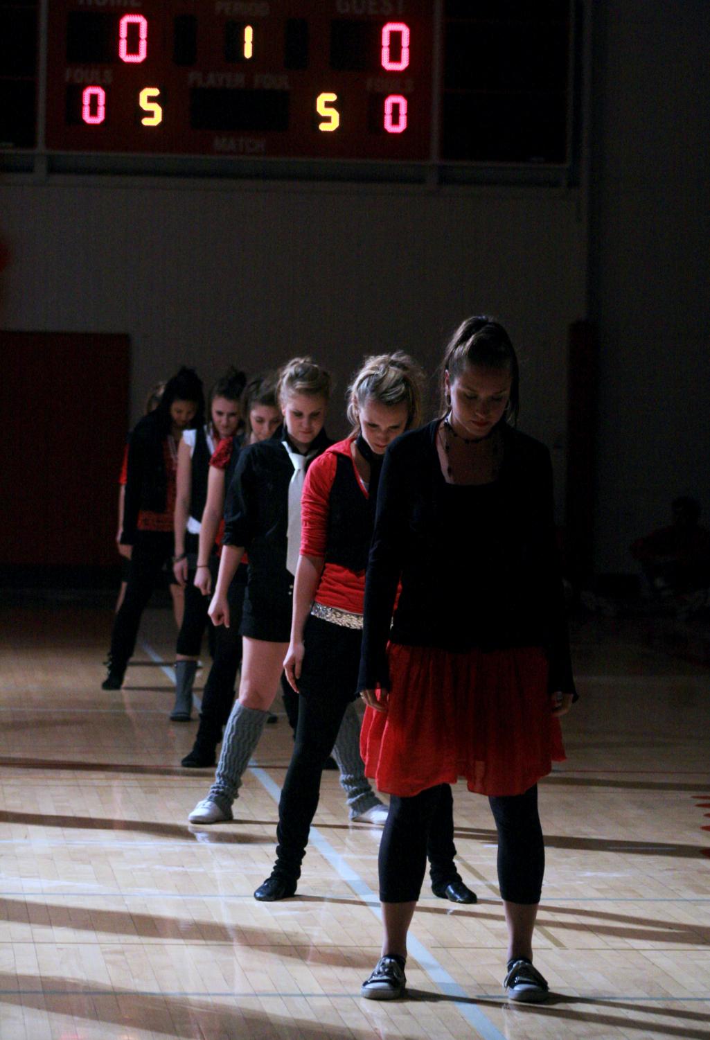 Biola's dance troupe, Xopoc, takes to the gym floor for their Midnight Madness performance.