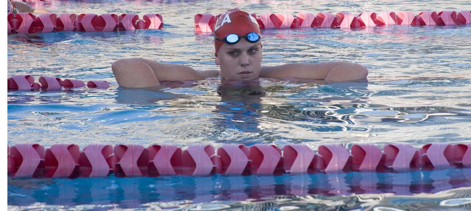 Freshman Hannah Lawman rests during practice. Lawman was one of several new natinoal qualifiers for the women's 200 breastroke.