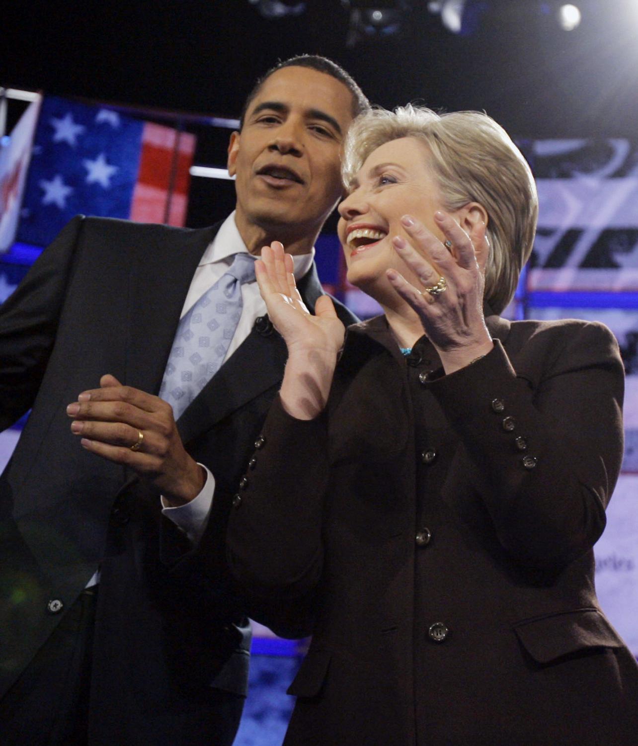 Democratic presidential hopefuls Sen. Hillary Rodham Clinton, D-N.Y., right, and Sen. Barack Obama, D-Ill., stand together before the start of a Democratic presidential debate in Los Angeles at the Kodak Theater, Thursday, Jan. 31, 2008.