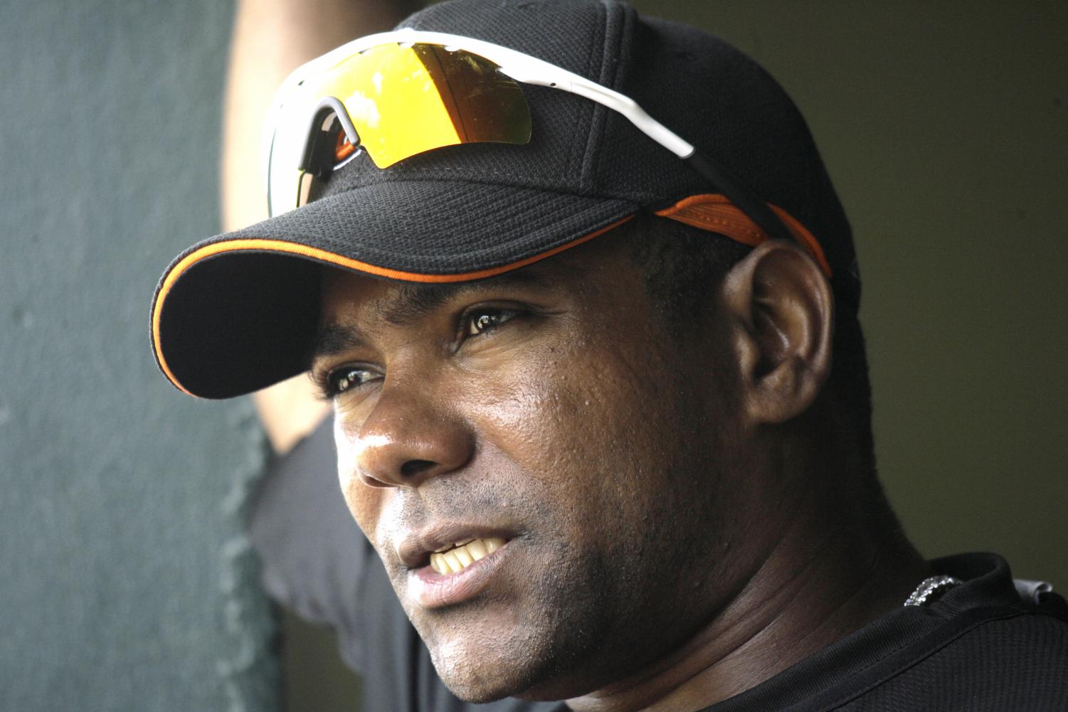 Baltimore Orioles infielder Miguel Tejada talks with reporters after practice at baseball spring training in Fort Lauderdale, Fla., in this Feb. 24, 2007 file photo. Congress is asking the Justice Department to investigate whether former AL MVP Miguel Tejada lied in 2005 to committee staff.