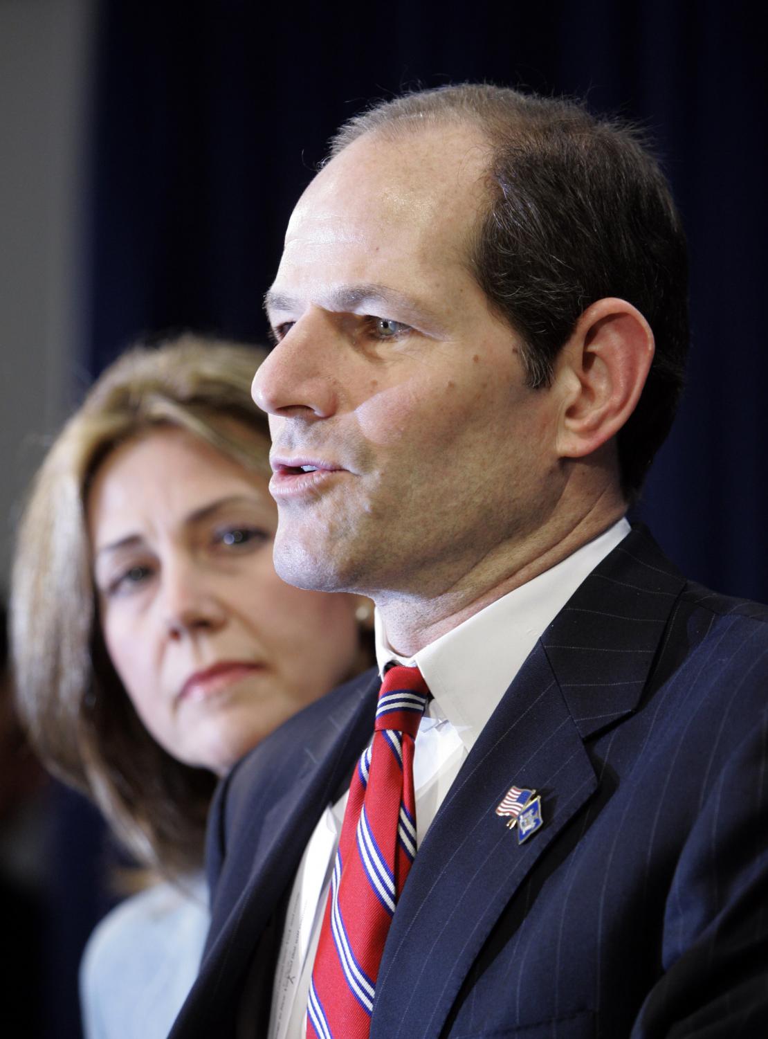 New York State Gov. Eliot Spitzer is joined by his wife Silda as he makes a statement to reporters during a news conference following a report that he was involved in a prostitution ring Monday, March 10, 2008 in New York.