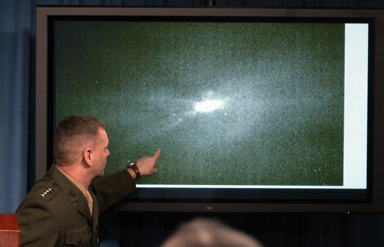 Joint Chiefs Vice Chairman Gen. James Cartwright points to a video during news conference at the Pentagon, Thursday, Feb. 21, 2008, hours after a Navy missile scored a direct hit on the failing spacecraft.