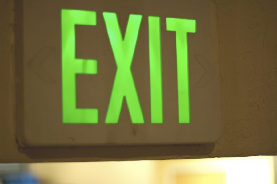 The exit signs contain a low-level radiation element called tritium, a glow-in-the-dark compound similar to what is found on wrist watch dials.