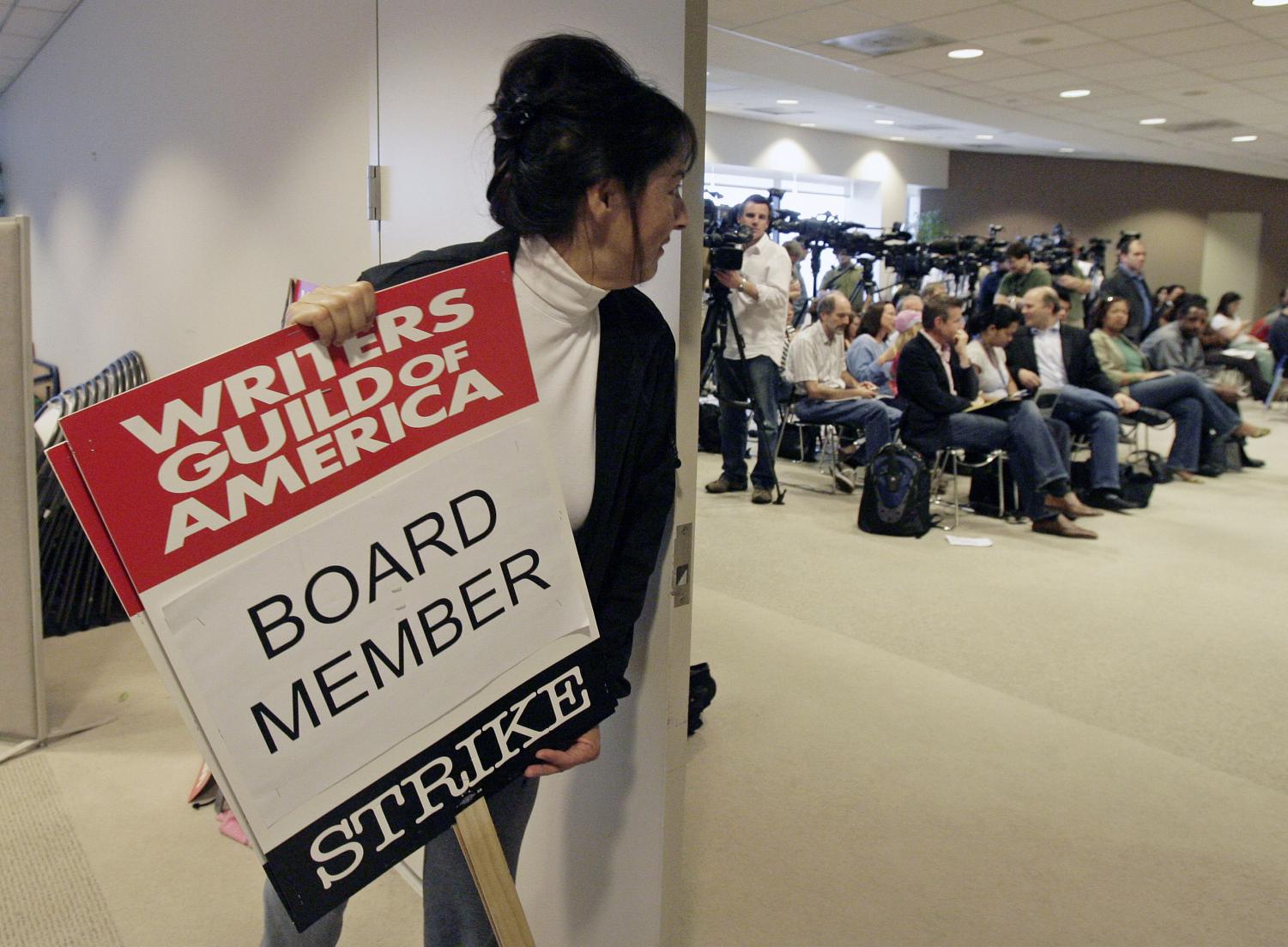 Writers Guild of America board member Nancy De Los Santos, who's also a film and television writer, waits for a news conference to start Sunday, Feb. 10, 2008, in Los Angeles. Union leaders representing striking movie and television writers today recommended approval of an agreement with producers to end a three-month-long walkout.