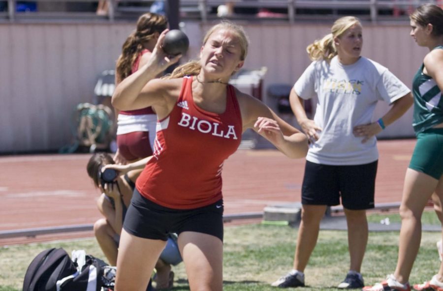 Freshman+Danielle+Voland+hurls+a+shotput+during+the+GSAC+Track+and+Field+Championships.+Voland+competes+in+both+throwing+and+sprinting+events.
