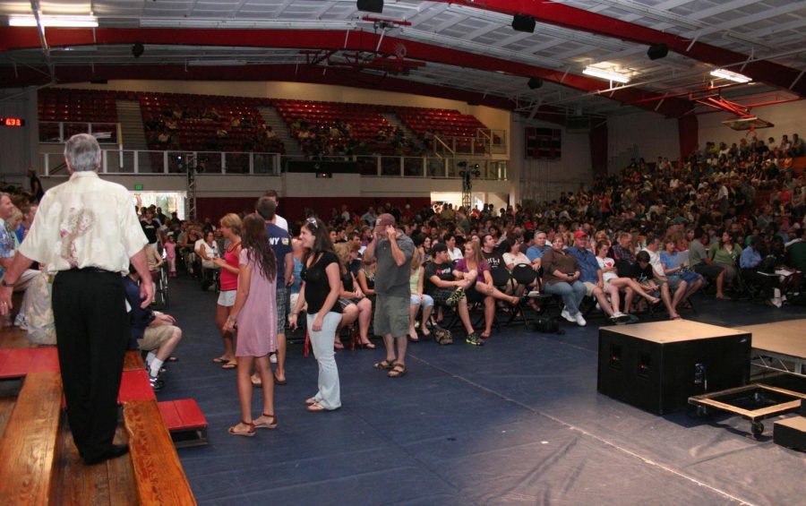 Parents and students gather for the first time in Chase Gymnasium for an official Biola welcome given by the admissions staff, SOS directors, and President Corey.