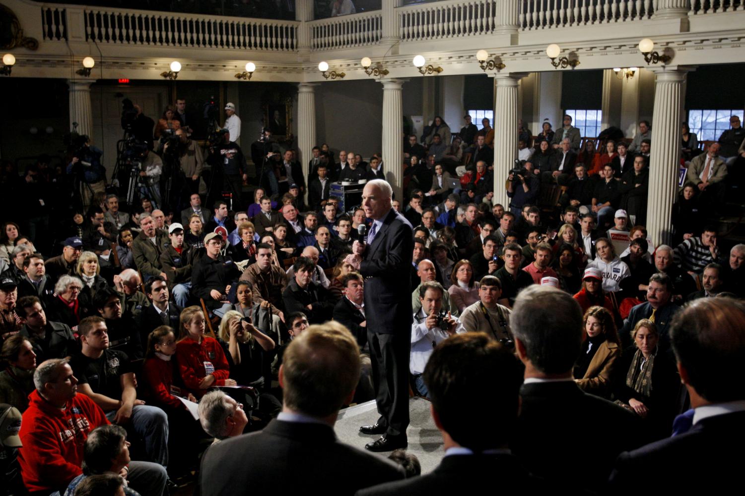 Republican presidential hopeful, Sen. John McCain, R-Ariz., center, speaks during a campaign rally in Faneuil Hall, in Boston, Mass., Monday, Feb. 4, 2008, one day ahead of the SuperTuesday primary elections. (AP Photo)