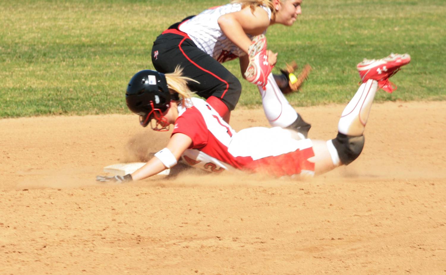 Sophomore Krista Johnson slides into second base during Wednesday's doubleheader against Holy Names University.