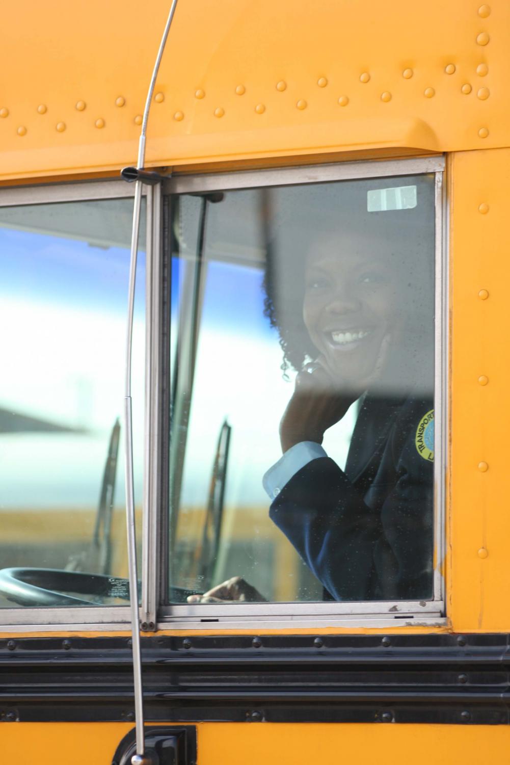 Tanya Walters sits in the bus she has used to impact the lives of many inner- city L.A. kids who would not otherwise have a chance to see the world.