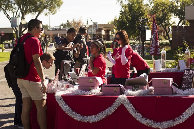 Members of the Biola community donated money at the collection table on Giving Tuesday.