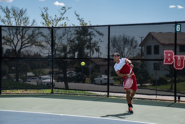 Late heroics lift men’s tennis