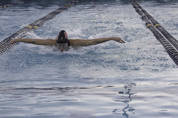 Swim rewrites record books in conference championships