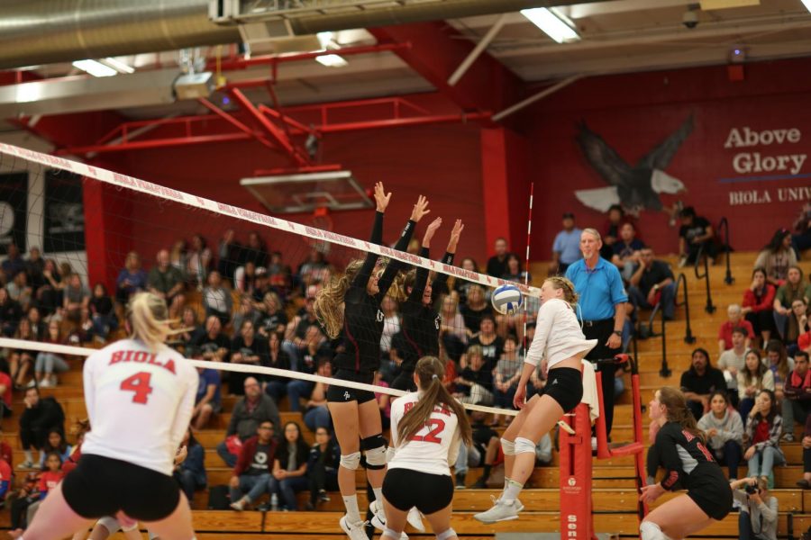 APU+Volleyball+successfully+blocks+an+attack+from+senior+opposite+hitter+Karly+Dantuma+%5Bleft%5D+in+this+file+photo+from+Oct.+3.
