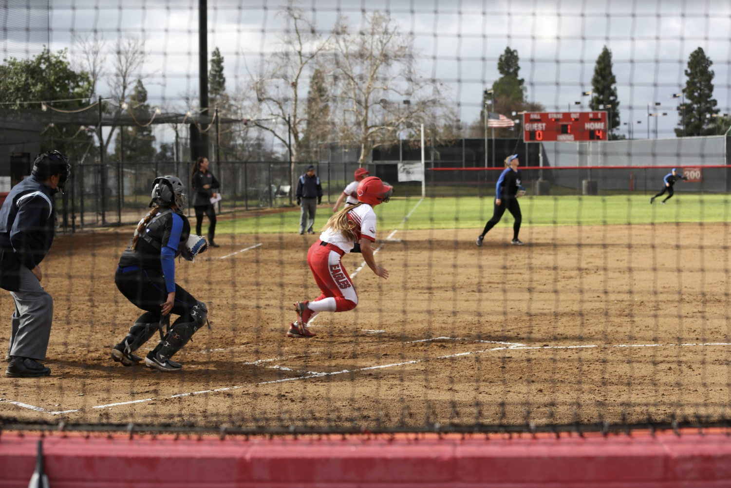 Softball splits doubleheader at Holy Names